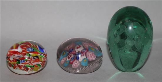 Three small glass paperweights